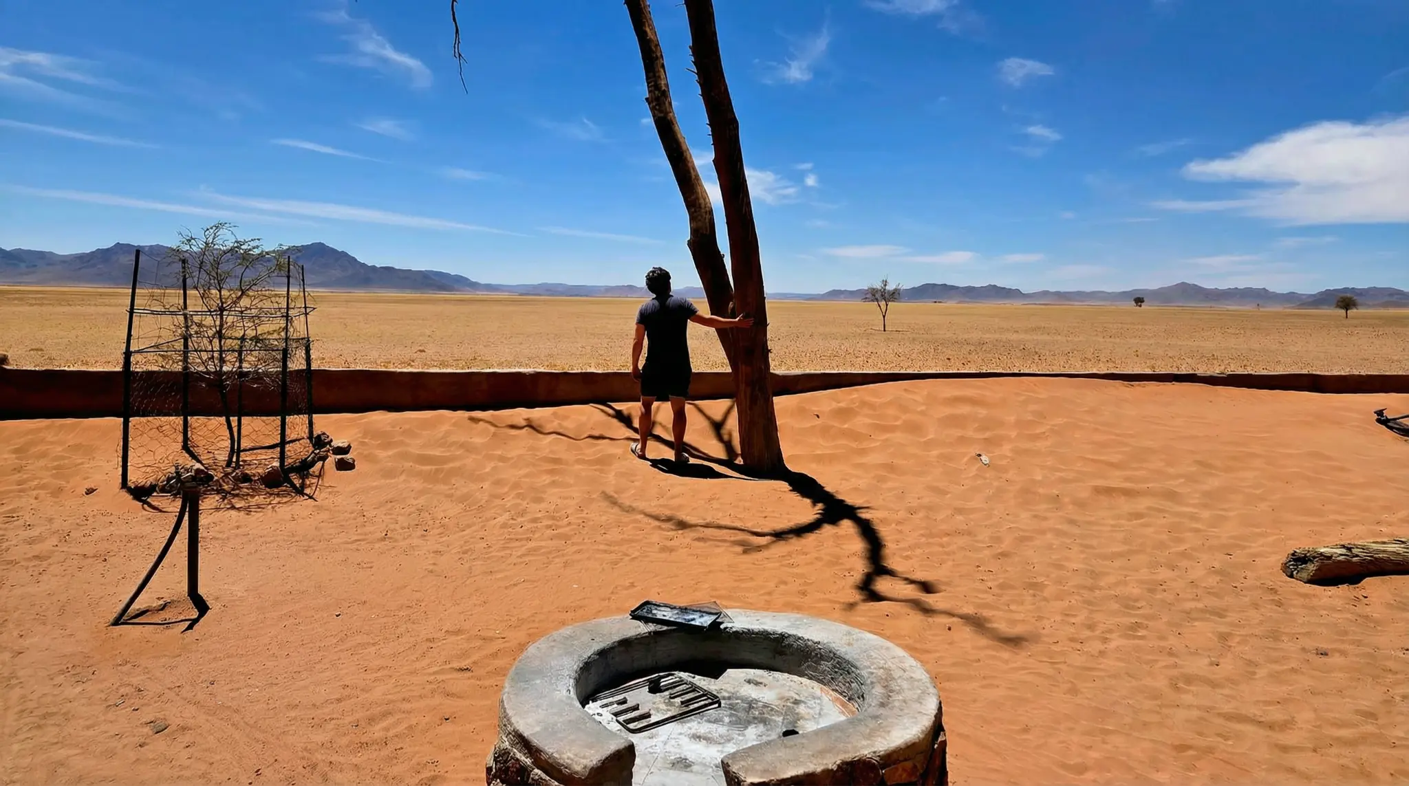 Solo camping in the vast Namibian desert landscape